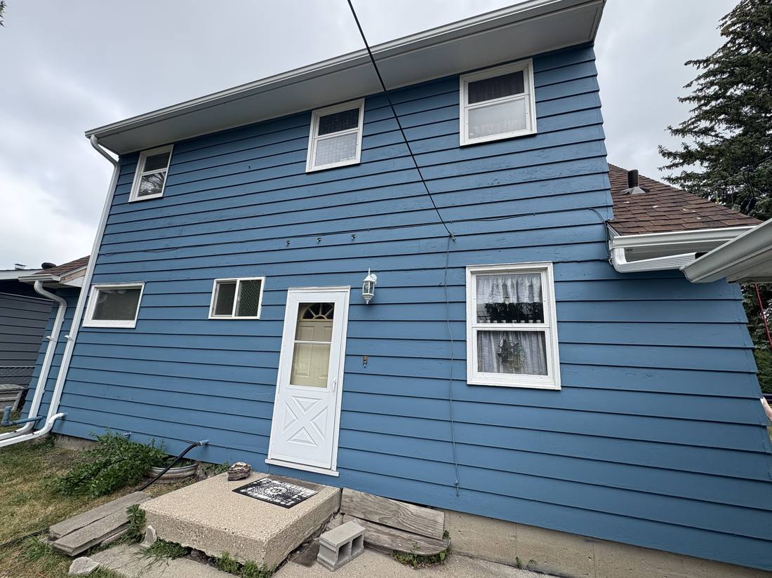 Finished blue exterior house paint job
