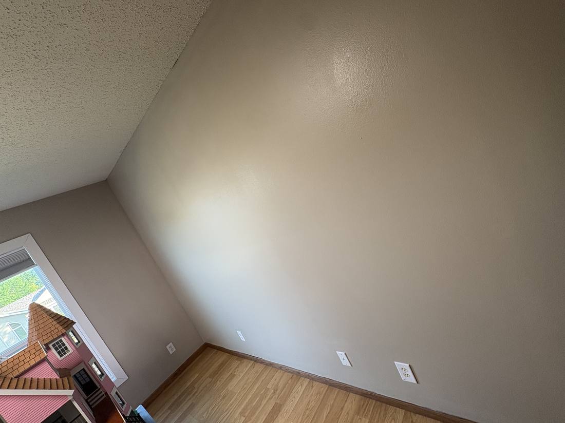 Bedroom wall repainted after